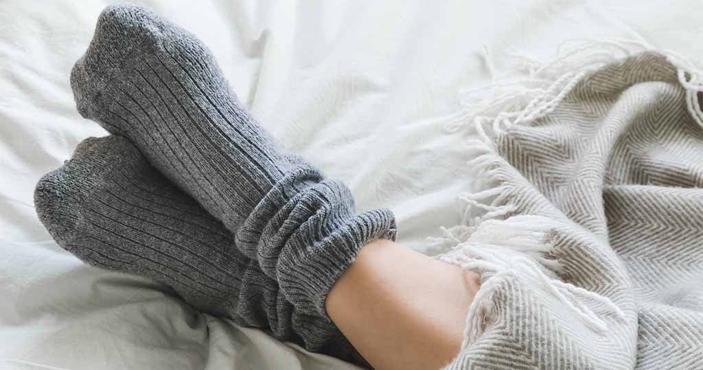 dormir en chaussettes
